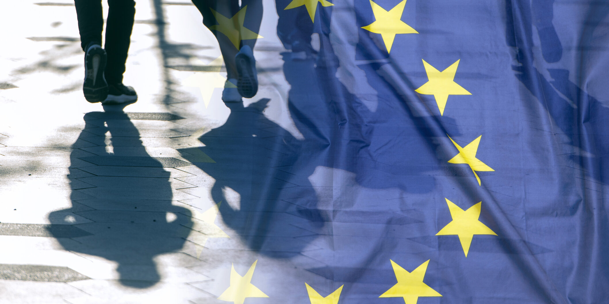 EU or European Union Flag and shadows of people, concept political picture