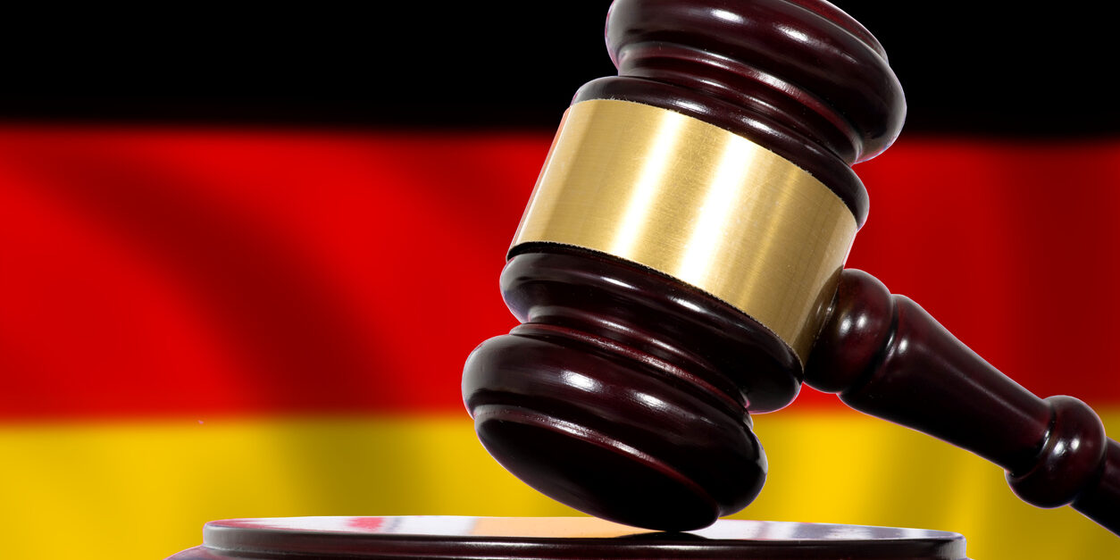 Flag of Germany, court and a judge’s hammer